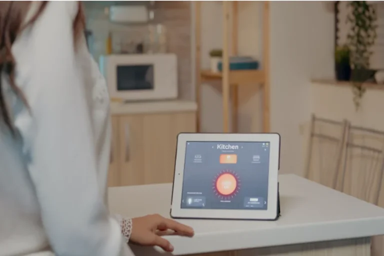 Young woman using smart home application with voice command to turn on the light by tablet